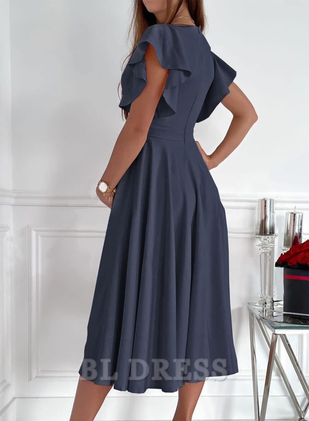 Side view of an elegant V-neck short sleeve A-line maxi dress.