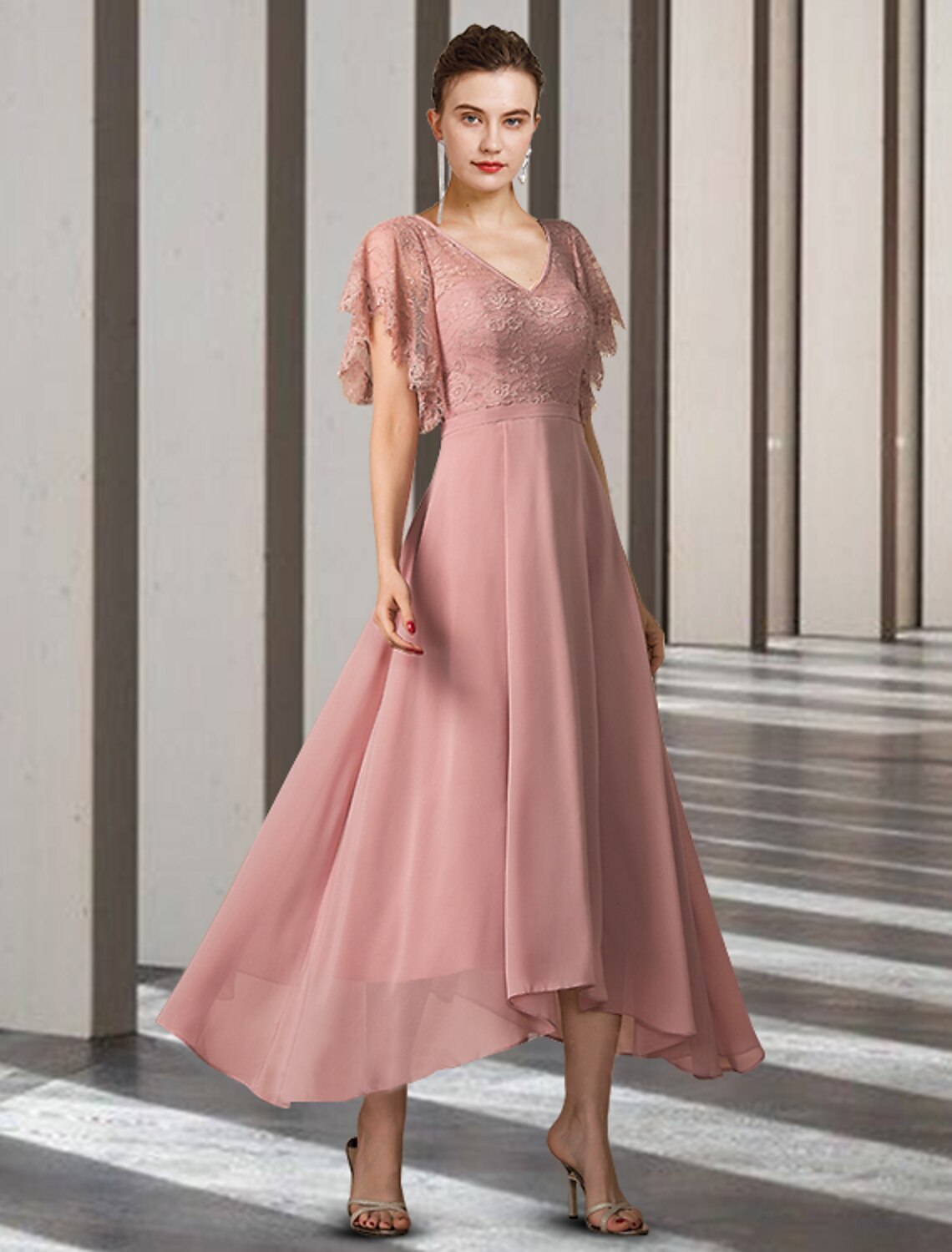Elegant A-Line Mother of the Bride dress with V-neck, short sleeves, high-low hem, and lace appliques.