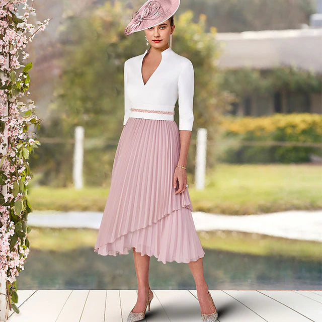Front view of an elegant A-Line V-Neck Mother of the Bride dress with short sleeves and high-low tea-length hem.