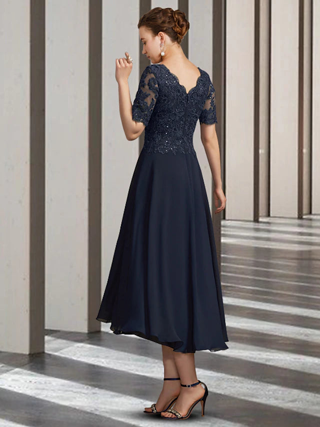 Back view of the A-Line Mother of the Bride dress, showcasing pleats and lace appliques.