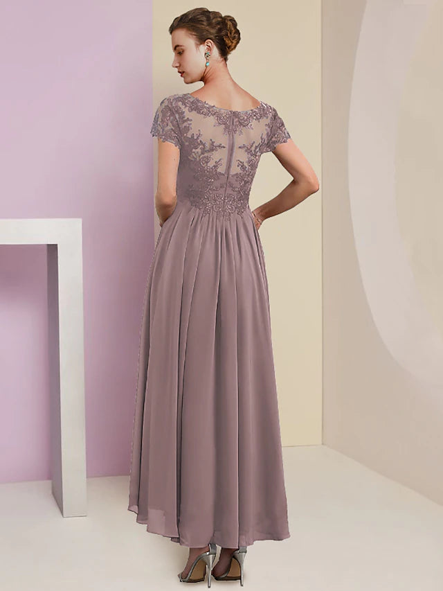 Woman posing in the V-neck short sleeve formal dress.