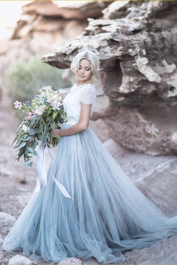 Elegant A-line lace top short sleeve wedding dress.