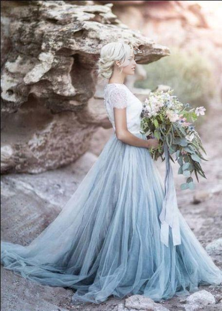 Full view of A-line V-neck lace wedding dress.