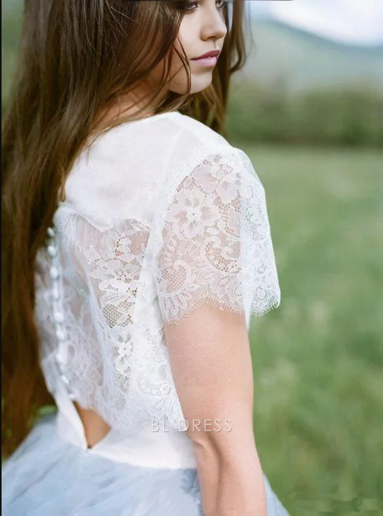 Back view of elegant lace top prom dress.