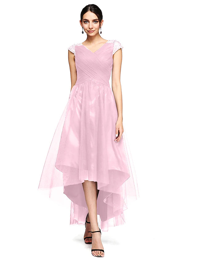 Elegant A-Line V-neck short sleeve tulle gown with open back and criss-cross beading, back view.