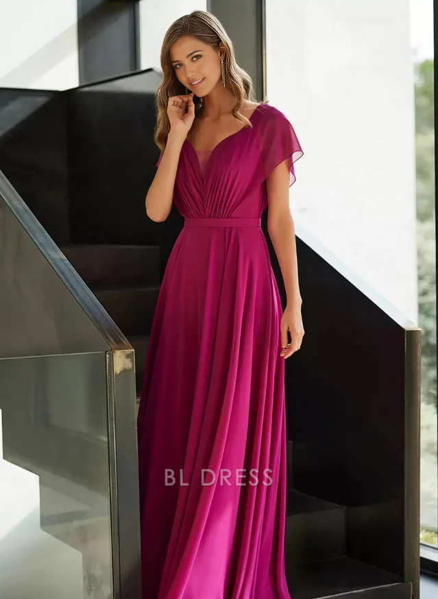Woman wearing an elegant A-Line V-Neck chiffon dress with short sleeves and pleats.