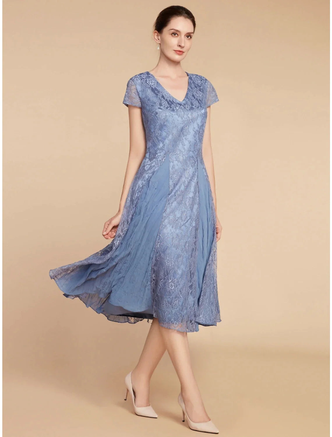Elegant A-line V-neck short sleeve dress with ruching and lace detail.