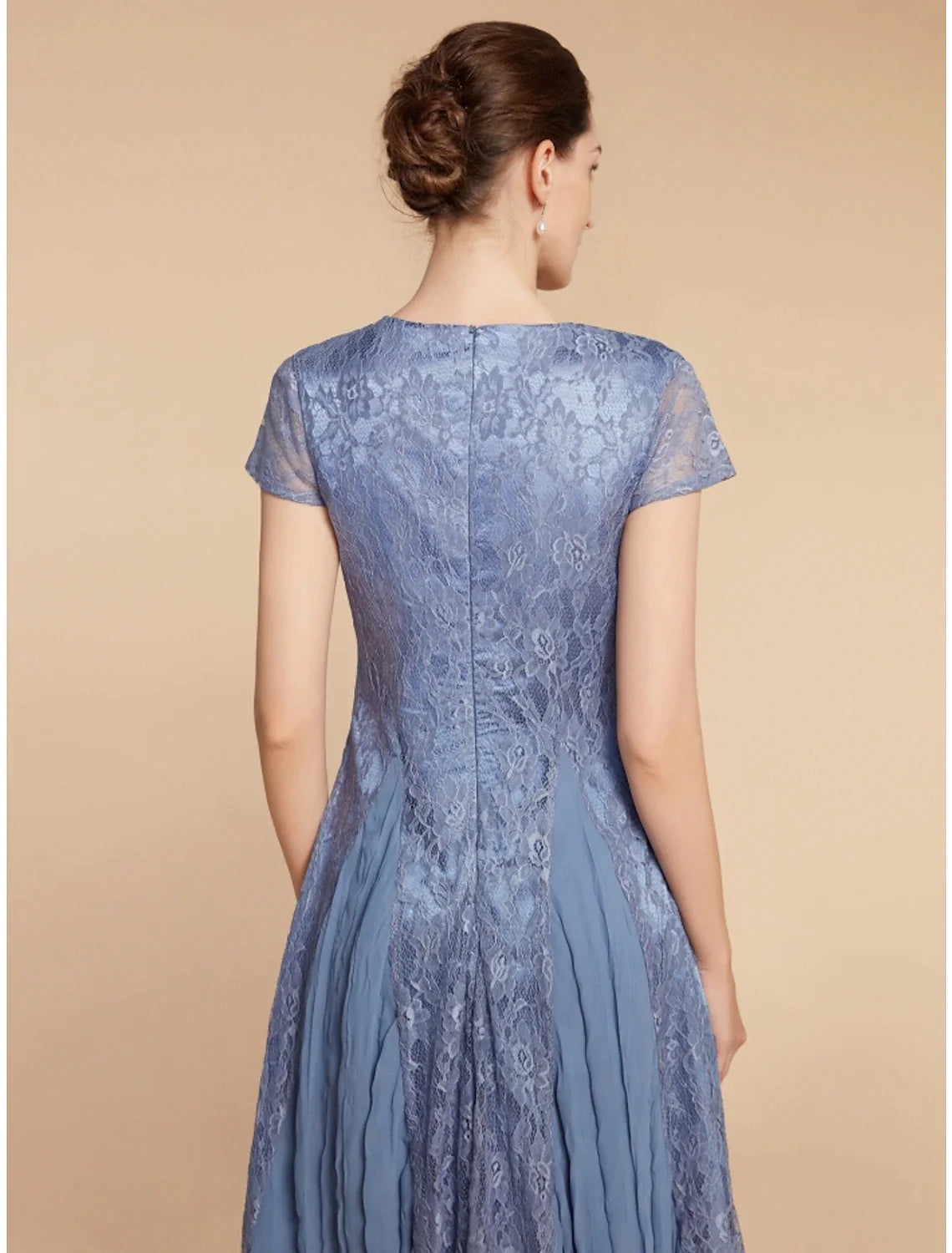 Side profile of the short sleeve A-line dress, highlighting the silhouette.