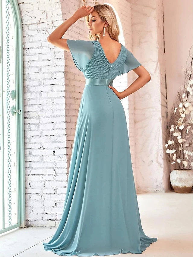 Close-up of the V-neckline and short sleeves on the evening gown.