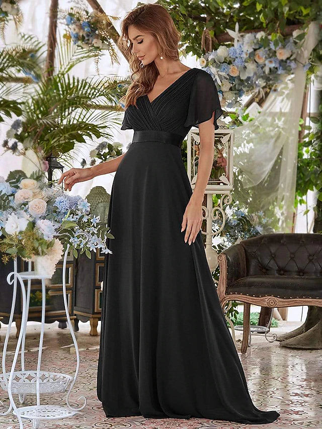 Side view of the floor-length chiffon dress.