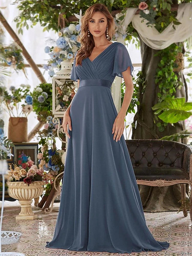 Detail of the flowing chiffon fabric and ruffles on the gown.