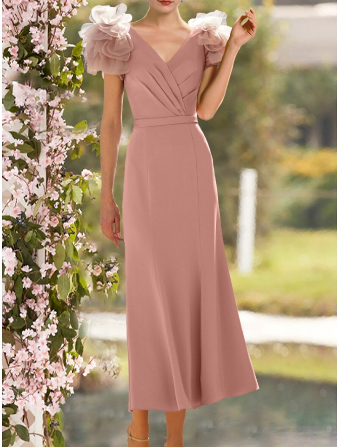 Back view of the A-Line satin gown featuring cascading ruffles and ruching.