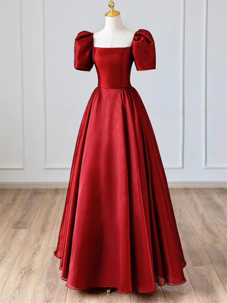 Model in elegant A-line satin V-neck short sleeve long formal dress.