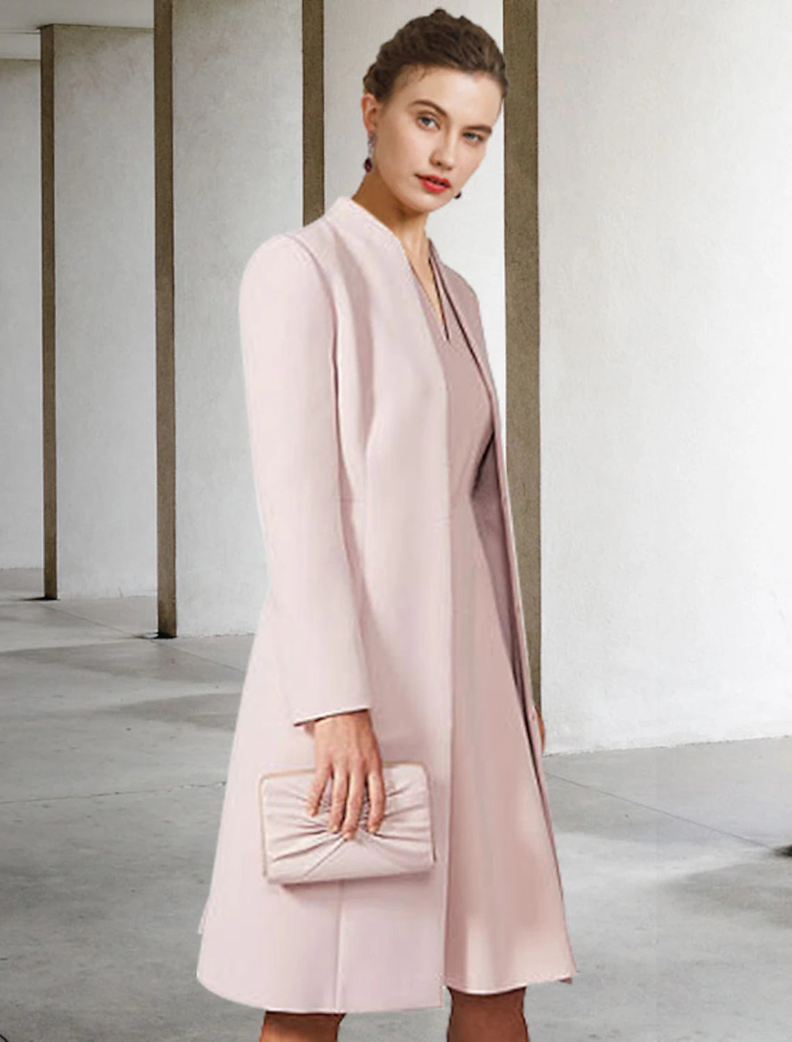 Model wearing the two-piece V-neck chiffon dress for a wedding.