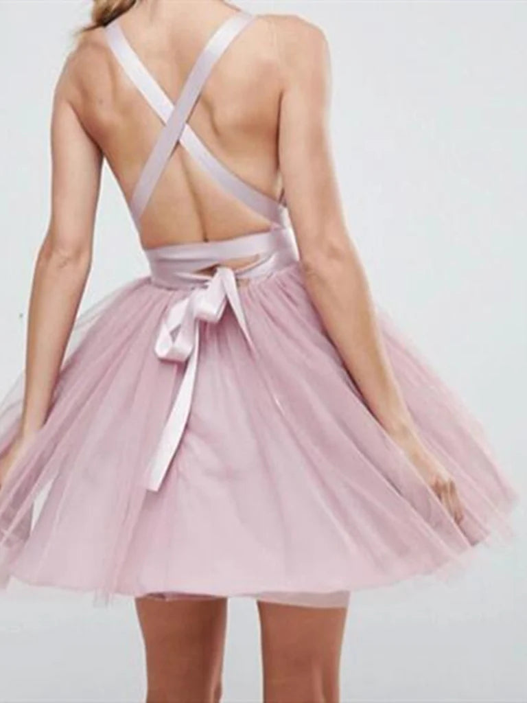 Side view of a short A-line V-neck tulle dress.