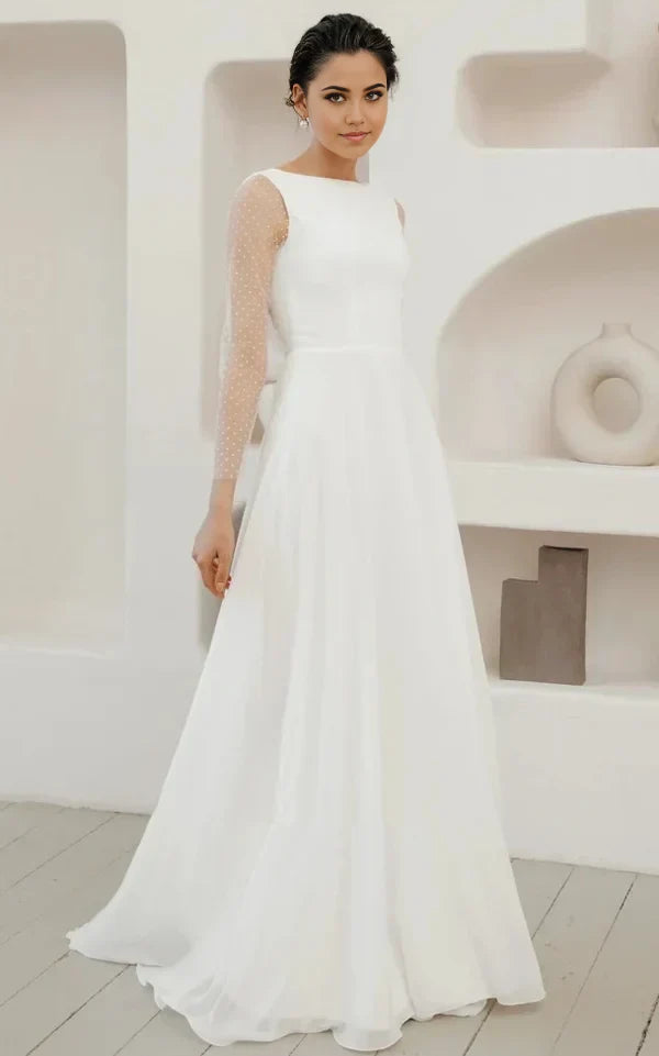 Elegant A-line chiffon wedding dress with pearl buttons and low back.