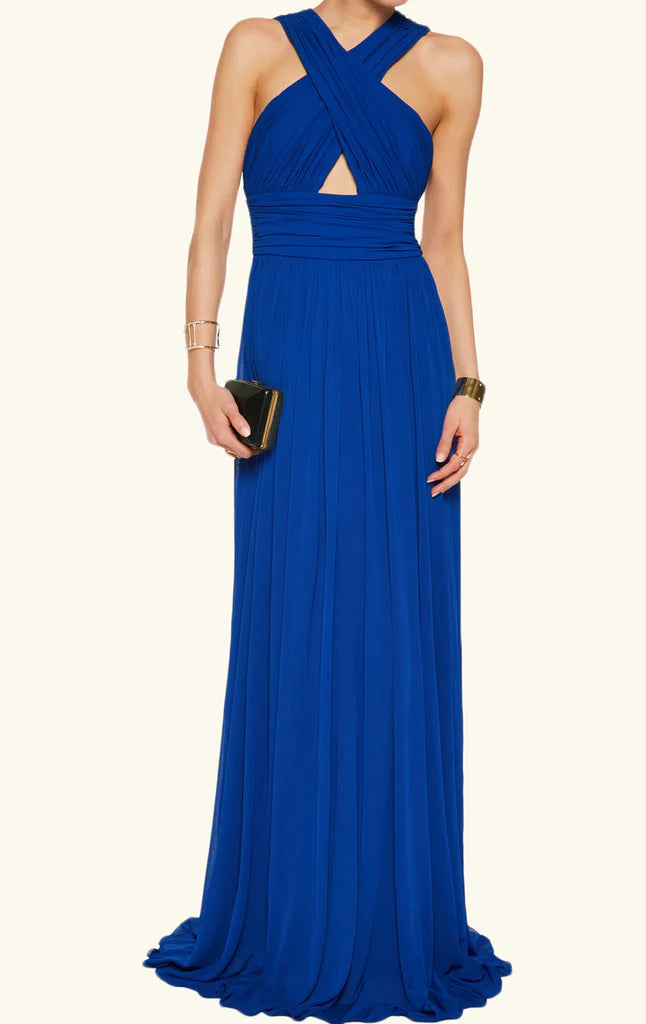 Woman wearing an elegant V-neck sleeveless chiffon formal gown.