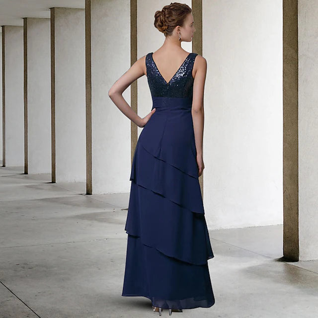 Full view of the elegant A-line dress, highlighting its floor-length design.