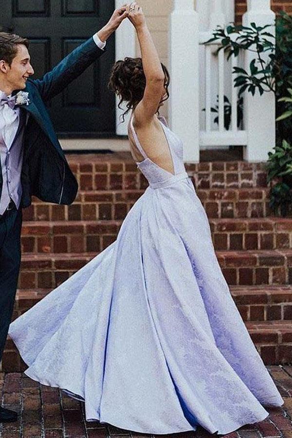 Back view of the lilac floral satin A-line prom dress, showing the sweep train.