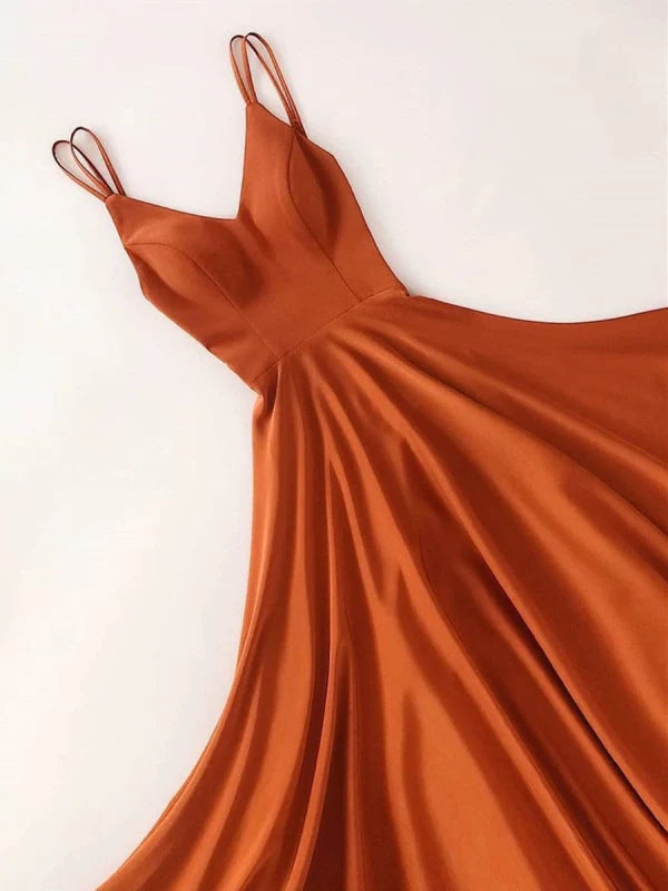 Elegant V-neck floor-length prom dress on a model.