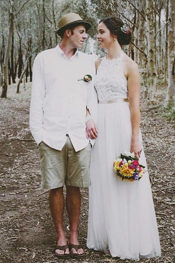 Close-up of the delicate lace top on a bridal dress.