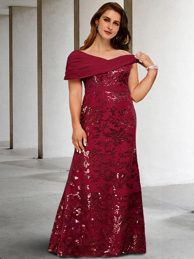 Elegant A-line plus size Mother of the Bride dress with V-neck, lace, and sequin appliques.