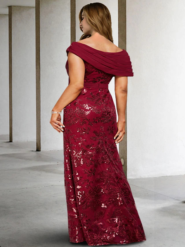 Close-up of the lace and sequin appliques on the V-neckline of the elegant Mother of the Bride dress.