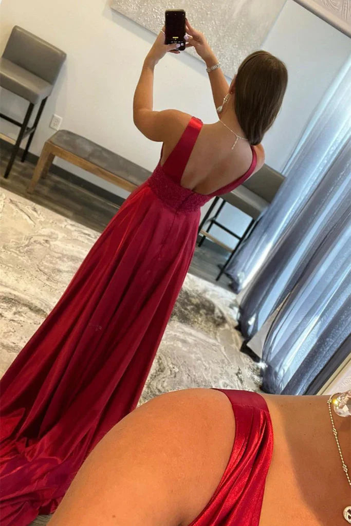 Back view of an A-line V-neck lace long prom dress.