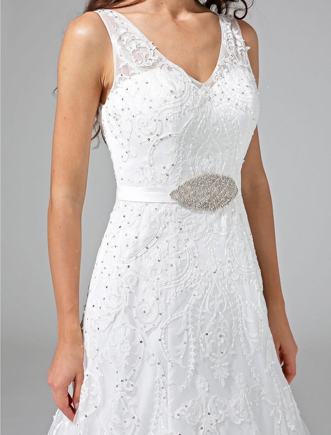 Back view of the wedding dress showing the court train and sash.