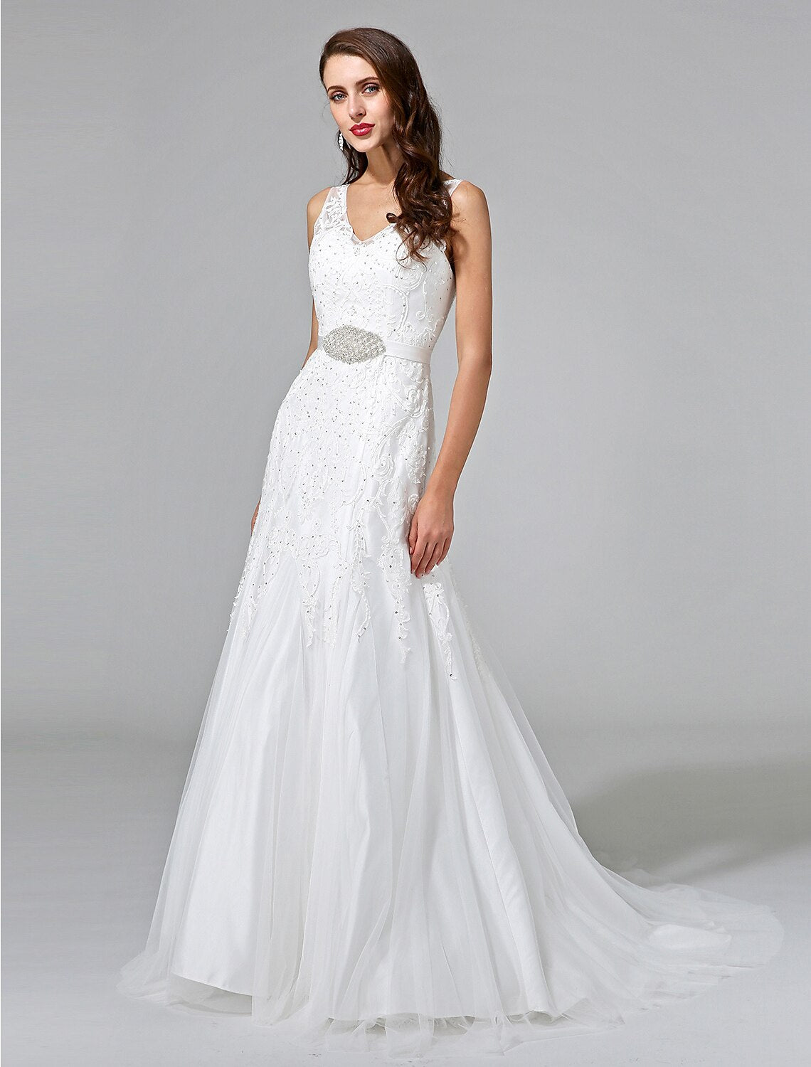 Full length view of the sleeveless A-line wedding dress.