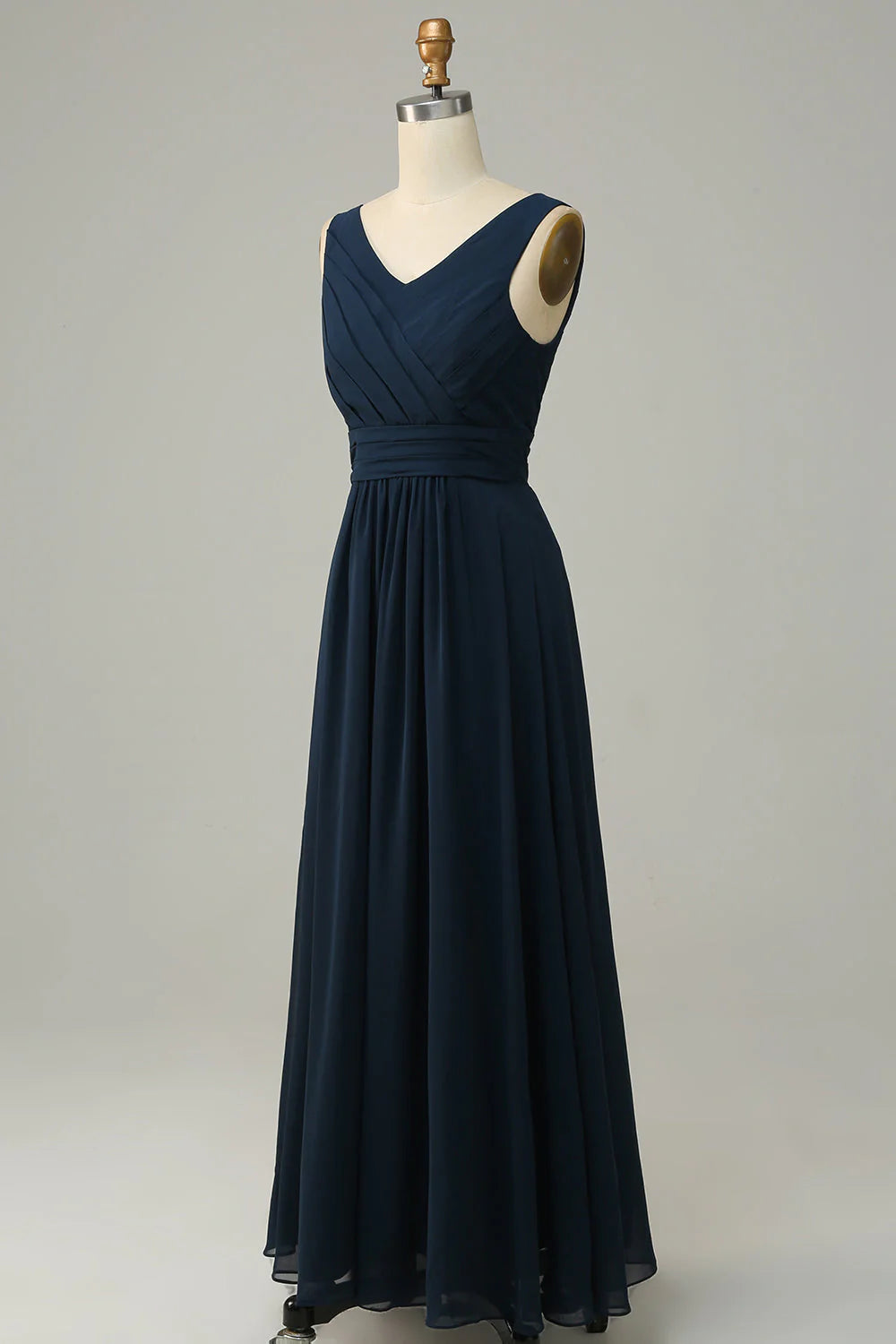 Back view of a navy A-line V-neck sleeveless long bridesmaid dress.