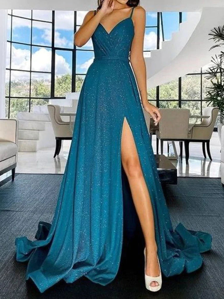 Woman wearing a long A-line V-neck prom dress with a high slit.