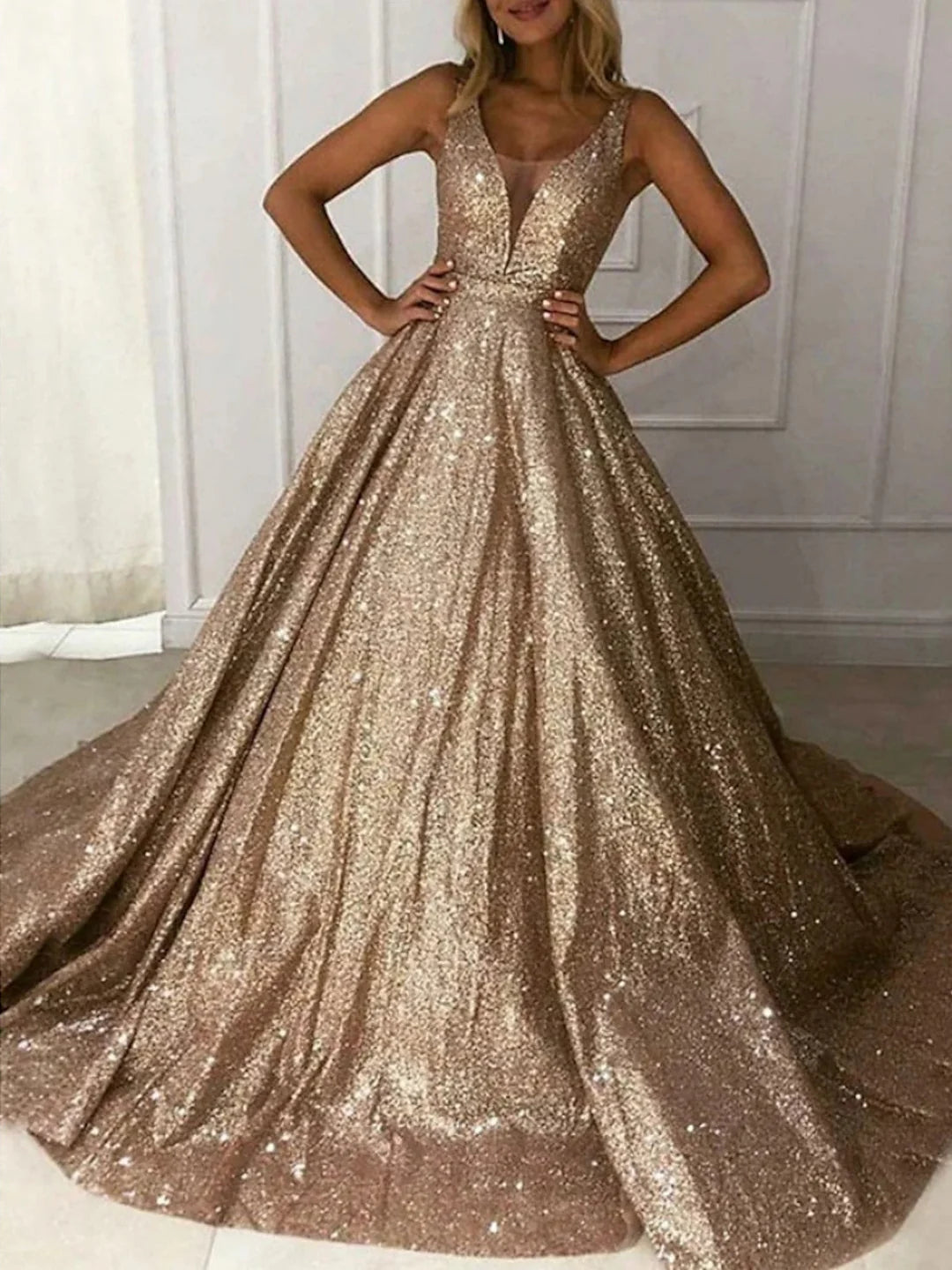 Elegant A-line V-neck sleeveless long prom dress.