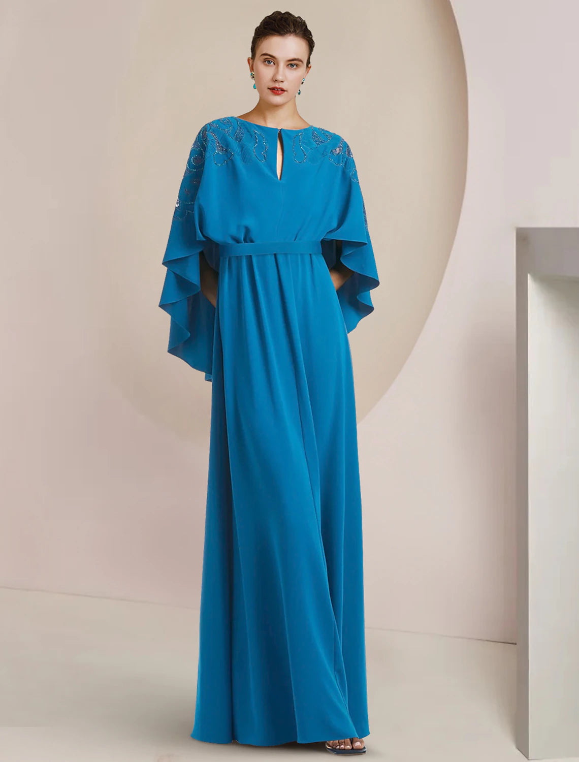 Side profile of the sleeveless stretch chiffon A-Line dress.