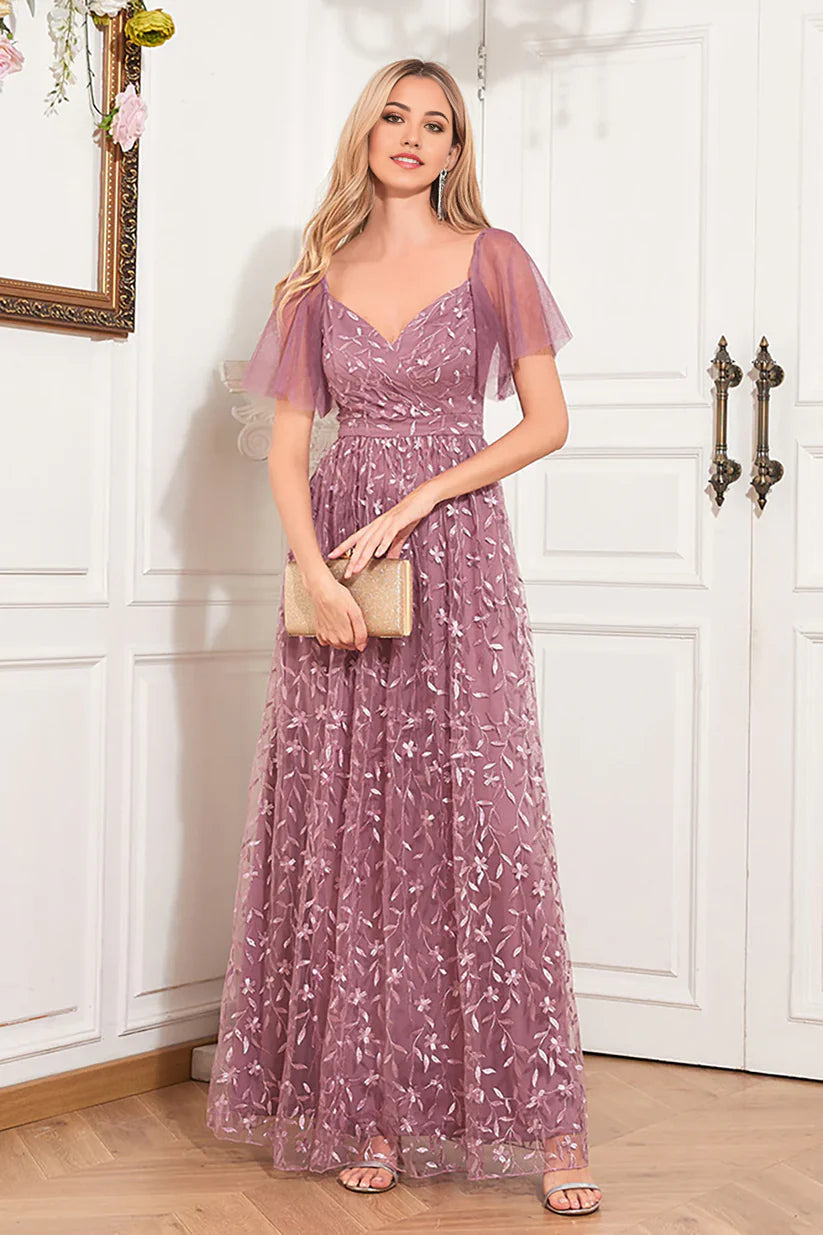 Side view of the sleeveless A-line dress, highlighting its flowing silhouette.