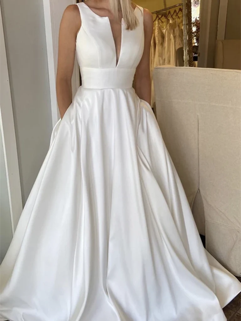 Elegant A-line satin wedding dress with a V-neckline.