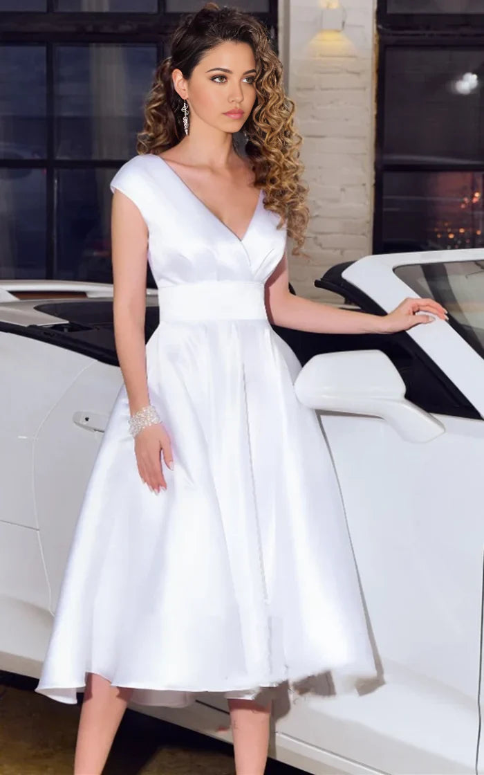 Back view of A-line V-neck satin tea-length wedding dress with sash.