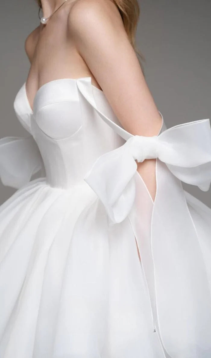 Side profile of the A-line V-neck sleeveless dress.