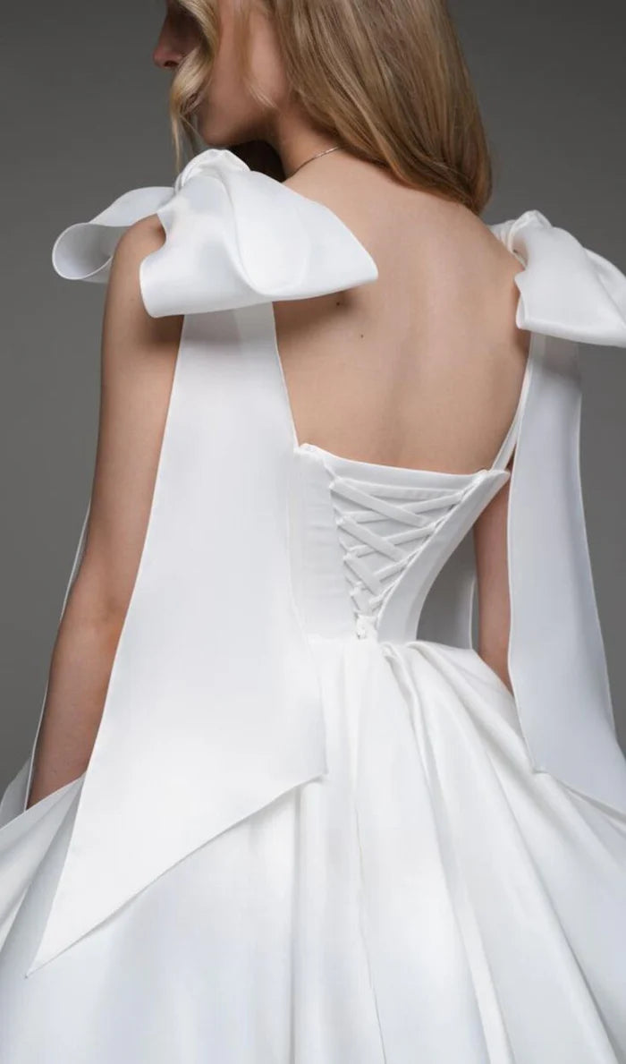 Back view of the A-line V-neck homecoming dress with simple straps.