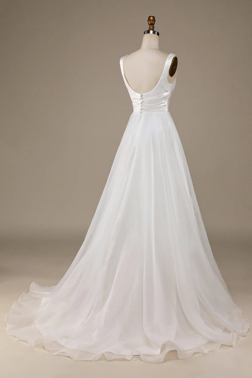 Back view of the ivory wedding dress, showcasing the sweep train.