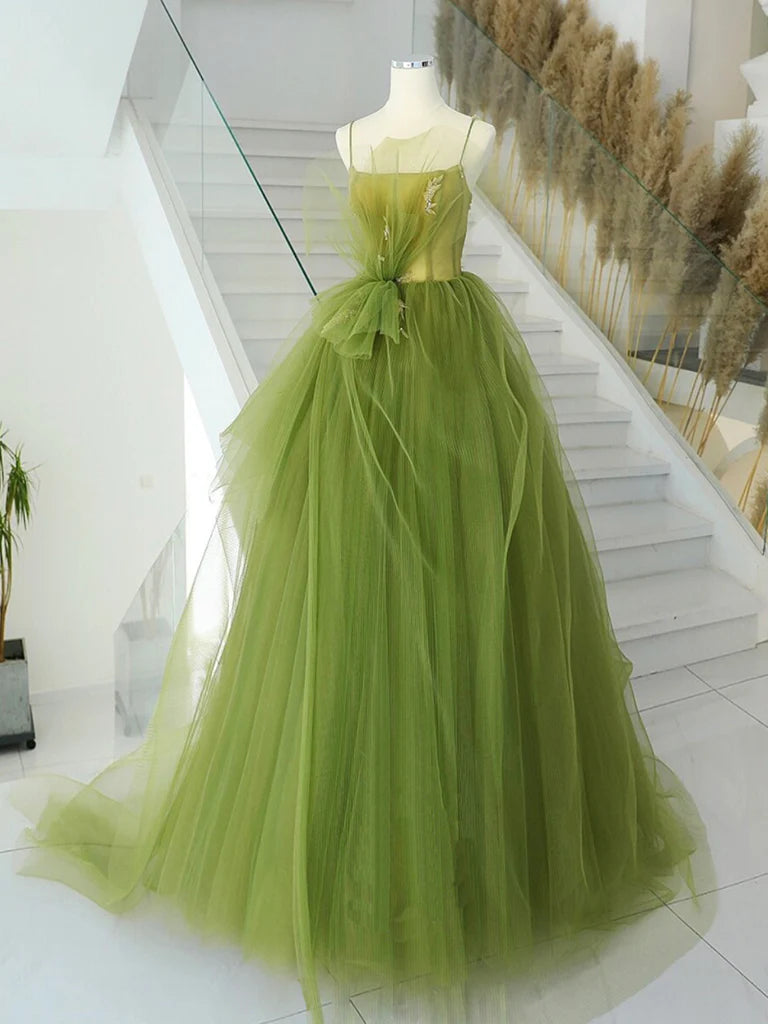 Full view of a green A-line tulle prom gown.