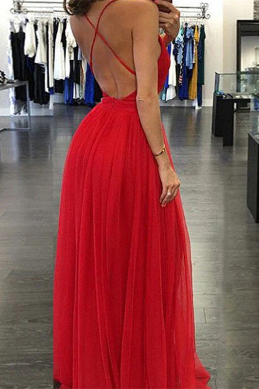 Back view of the red V-neck long prom dress, showing the flowing skirt.