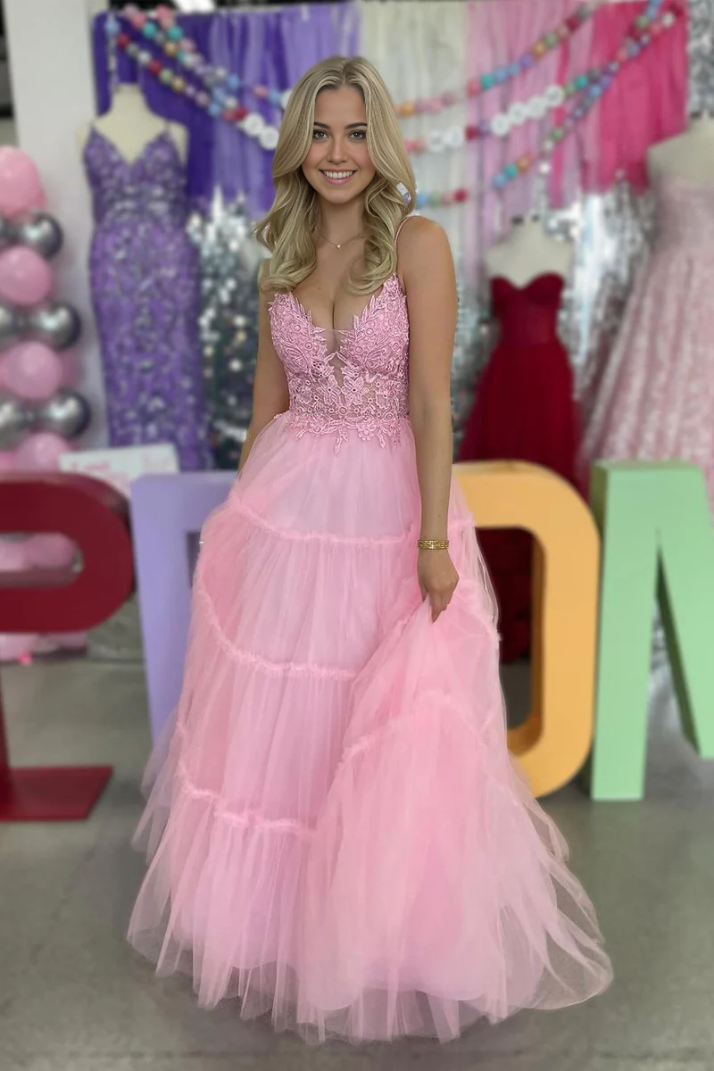 Pink A-line tulle prom dress with spaghetti straps and appliques.