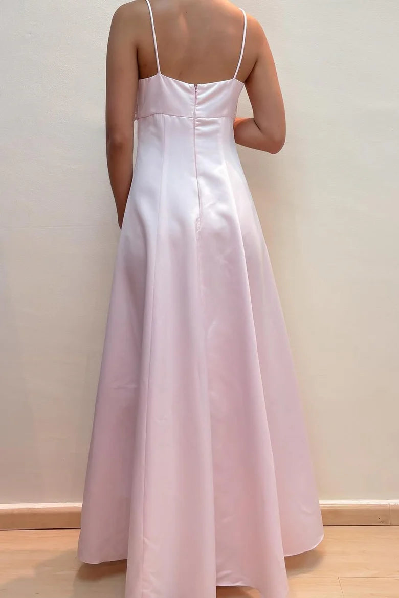 Back view of pink satin prom dress showing empire waist.