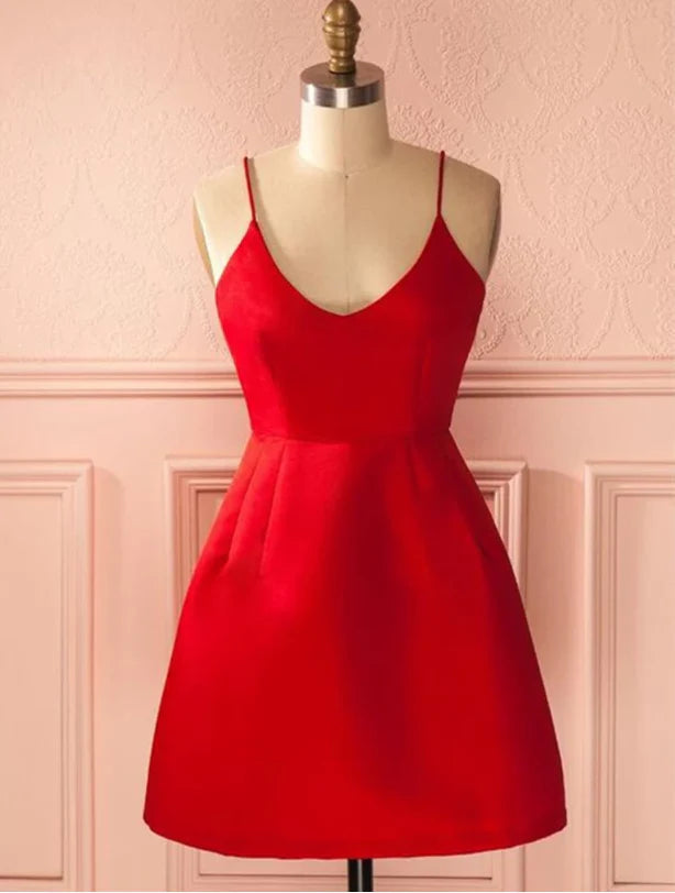 Elegant A-line short dress with spaghetti straps and V-neck, suitable for formal events.