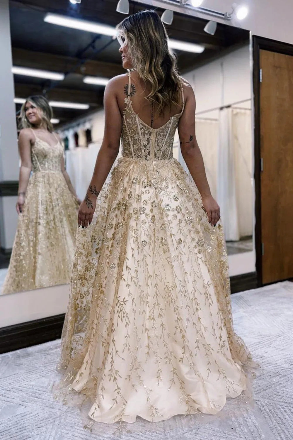 Full length view of A-line prom dress with flowing skirt.