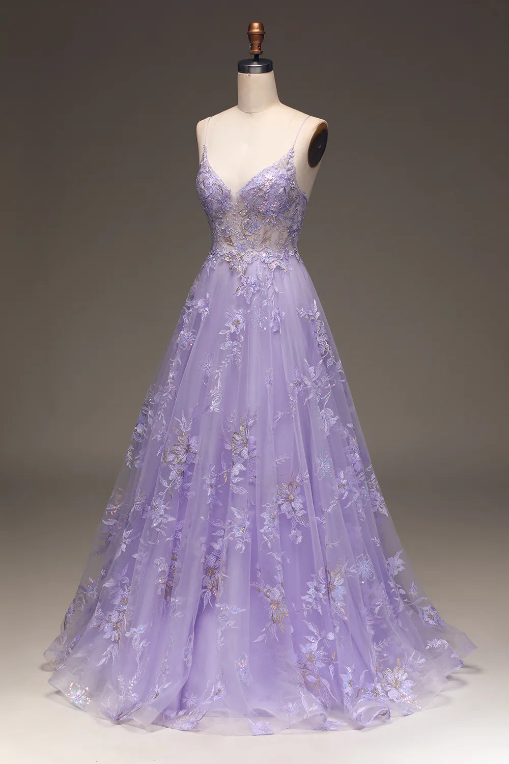 Close-up of the delicate appliques on the A-line dress.