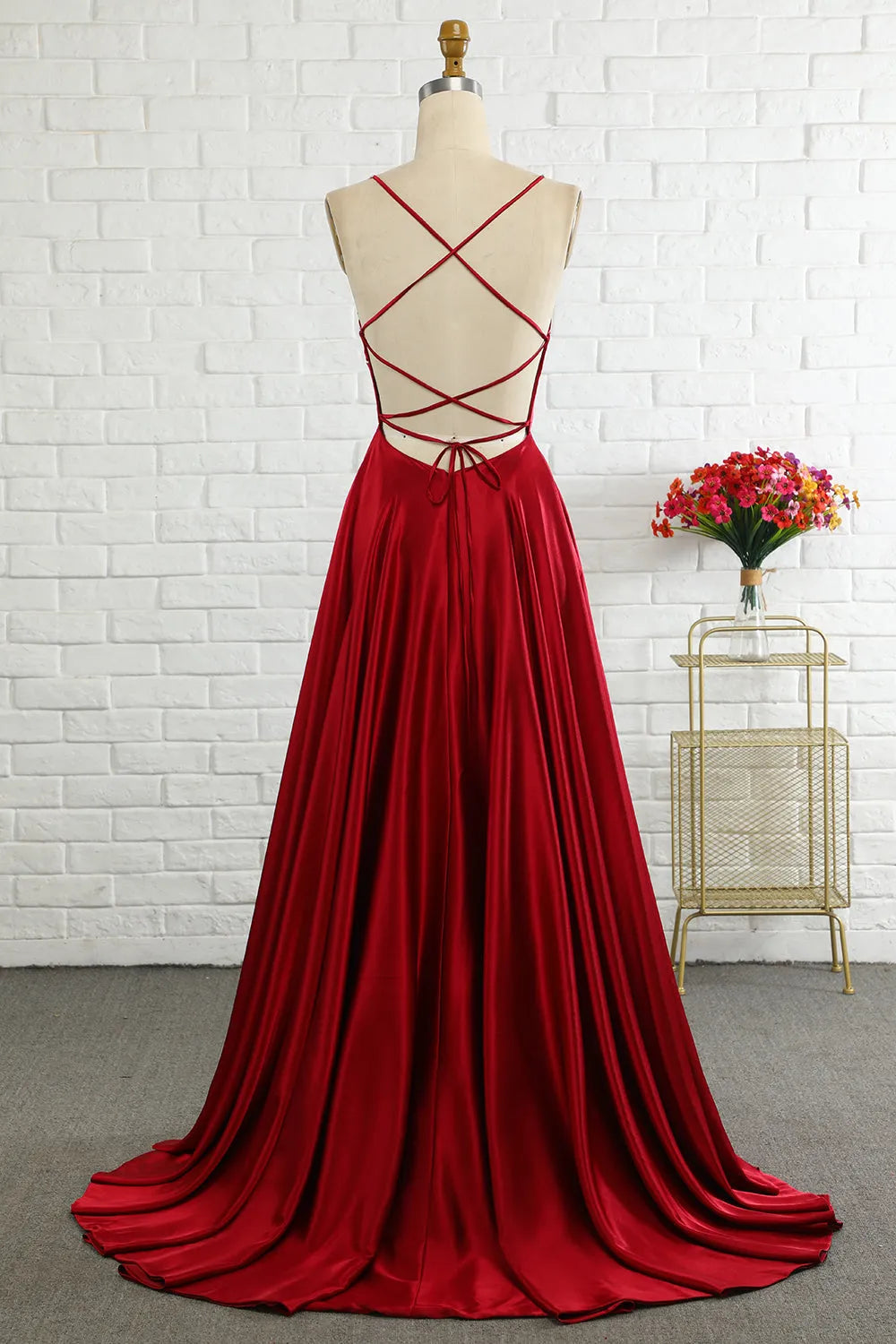 Back view of A-line prom dress showing criss-cross straps.