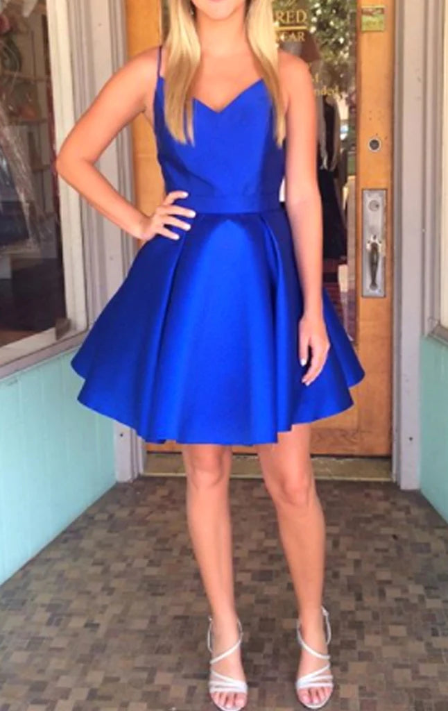 Elegant A-line V-neck spaghetti strap gown for formal occasions.