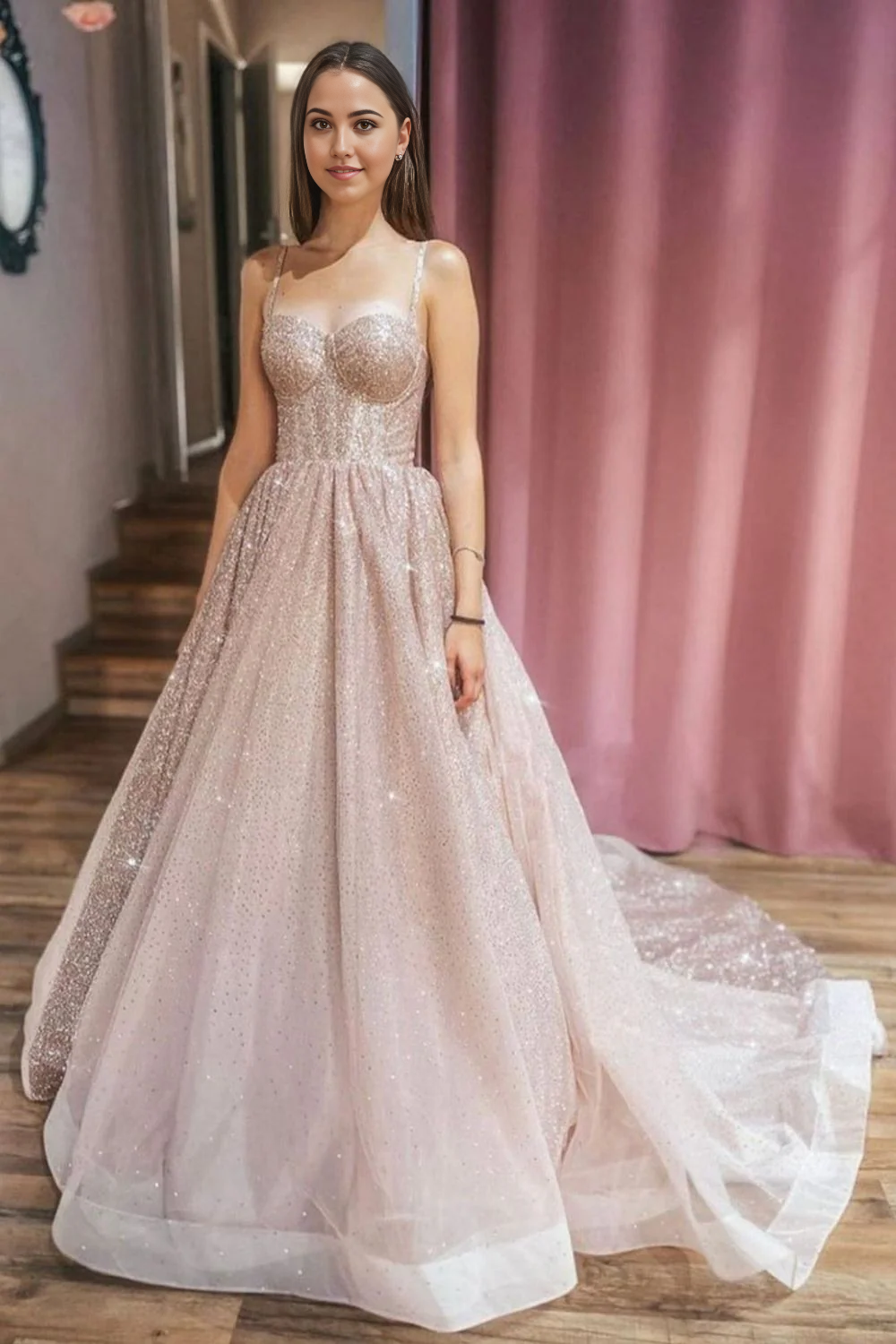 Pink A-line prom dress with spaghetti straps and V-neck, front view.